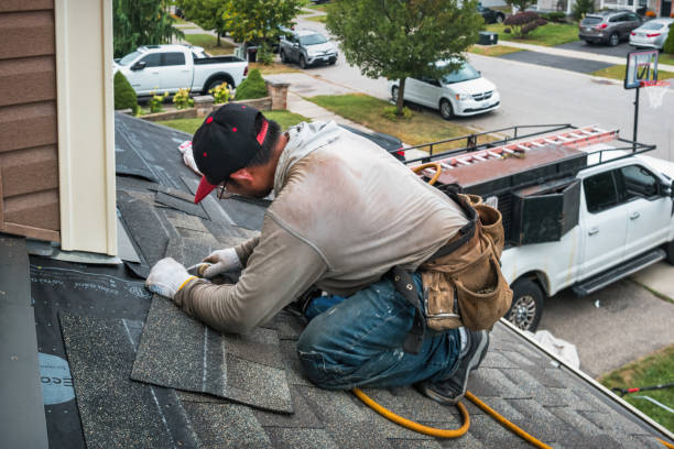 Professional Roofing technician working in New Boston, NH
